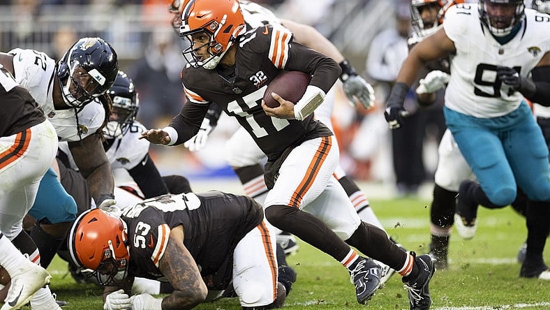 Dec 10, 2023; Cleveland, Ohio, USA; Cleveland Browns quarterback Dorian Thompson-Robinson (17) runs the ball against the Jacksonville Jaguars during the fourth quarter at Cleveland Browns Stadium. Mandatory Credit: Scott Galvin-USA TODAY Sports