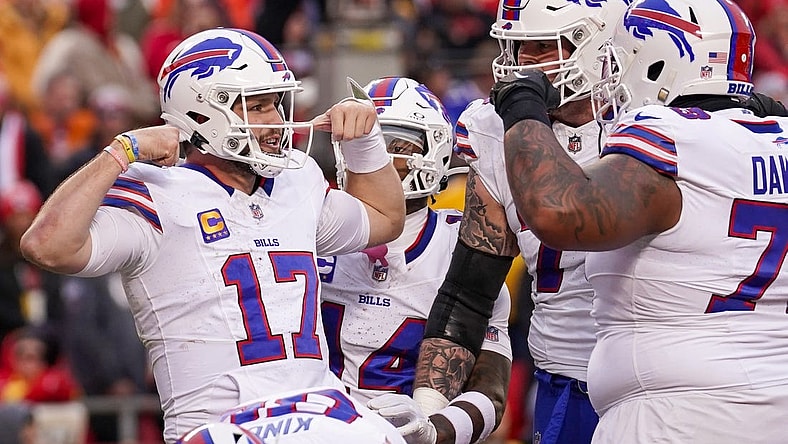 Dec 10, 2023; Kansas City, Missouri, USA; Buffalo Bills quarterback Josh Allen (17) celebrates with team mates after a score against the Kansas City Chiefs during the first half at GEHA Field at Arrowhead Stadium. Mandatory Credit: Denny Medley-USA TODAY Sports