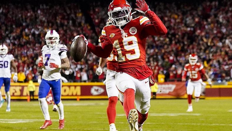 Dec 10, 2023; Kansas City, Missouri, USA; Kansas City Chiefs wide receiver Kadarius Toney (19) scores a touchdown during the second half against the Buffalo Bills at GEHA Field at Arrowhead Stadium. The play would be called back due to an offensive penalty. Mandatory Credit: Jay Biggerstaff-USA TODAY Sports