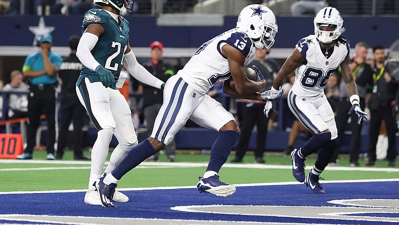 Dec 10, 2023; Arlington, Texas, USA; Dallas Cowboys wide receiver Michael Gallup (13) catches a touchdown pass against Philadelphia Eagles cornerback James Bradberry (24) in the second quarter at AT&T Stadium. Mandatory Credit: Tim Heitman-USA TODAY Sports