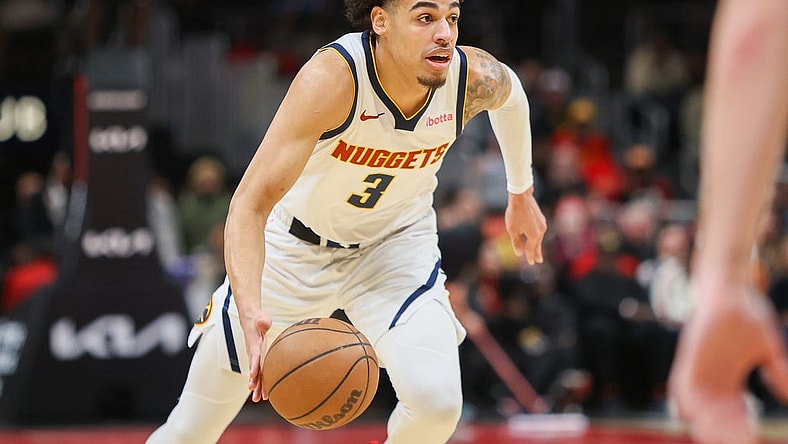 Dec 11, 2023; Atlanta, Georgia, USA; Denver Nuggets guard Julian Strawther (3) dribbles against the Atlanta Hawks in the second quarter at State Farm Arena. Mandatory Credit: Brett Davis-USA TODAY Sports