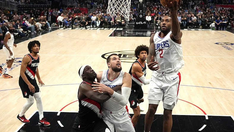 Dec 11, 2023; Los Angeles, California, USA; LA Clippers forward Kawhi Leonard (2) shoots the ball against the Portland Trail Blazers in the second half at Crypto.com Arena. Mandatory Credit: Kirby Lee-USA TODAY Sports
