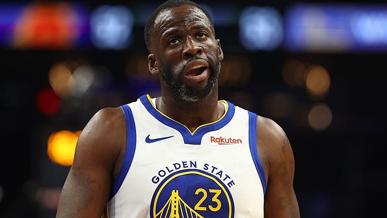 Dec 12, 2023; Phoenix, Arizona, USA; Golden State Warriors forward Draymond Green (23) reacts against the Phoenix Suns at Footprint Center. Mandatory Credit: Mark J. Rebilas-USA TODAY Sports