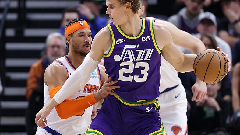 Dec 13, 2023; Salt Lake City, Utah, USA; Utah Jazz forward Lauri Markkanen (23) posts up against New York Knicks guard Josh Hart (3) during the second quarter at Delta Center. Mandatory Credit: Rob Gray-USA TODAY Sports