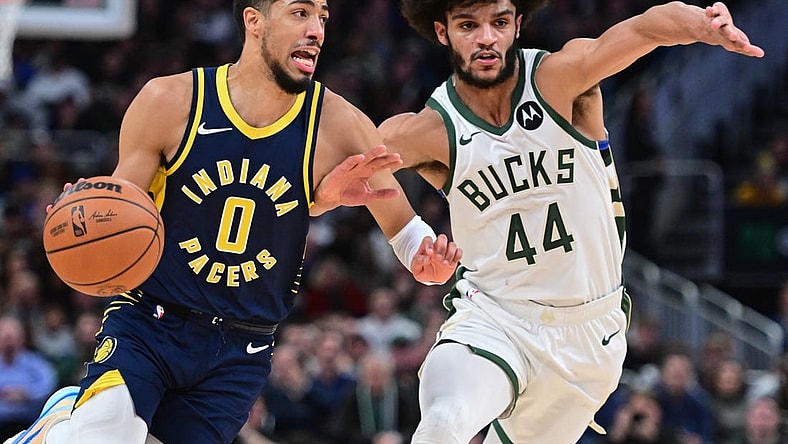 Dec 13, 2023; Milwaukee, Wisconsin, USA;  Indiana Pacers guard Tyrese Haliburton (0) drives for the basket against Milwaukee Bucks guard Andre Jackson Jr. (44) in the second quarter at Fiserv Forum. Mandatory Credit: Benny Sieu-USA TODAY Sports