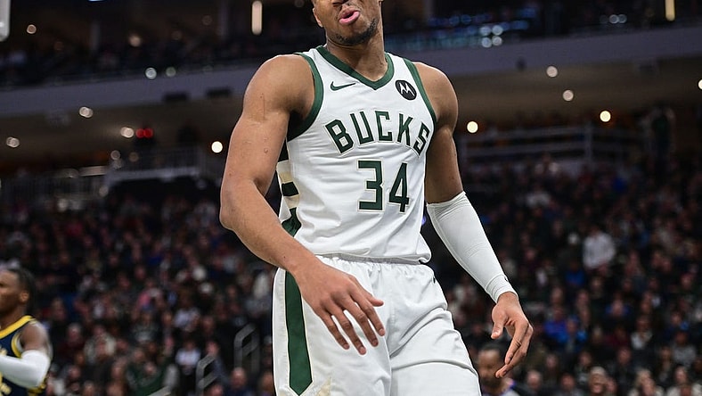 Dec 13, 2023; Milwaukee, Wisconsin, USA; Milwaukee Bucks forward Giannis Antetokounmpo (34) reacts after scoring a basket in the third quarter against the Indiana Pacers at Fiserv Forum. Mandatory Credit: Benny Sieu-USA TODAY Sports
