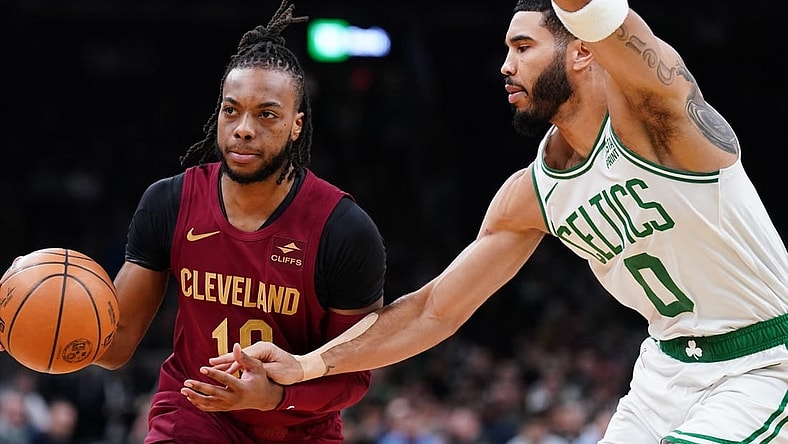 Dec 14, 2023; Boston, Massachusetts, USA; Cleveland Cavaliers guard Darius Garland (10) drives the ball against Boston Celtics forward Jayson Tatum (0) in the first quarter at TD Garden. Mandatory Credit: David Butler II-USA TODAY Sports