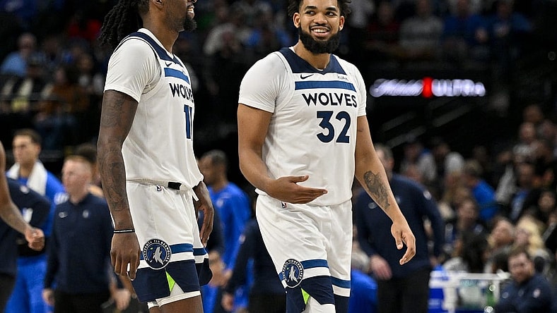 Dec 14, 2023; Dallas, Texas, USA; Minnesota Timberwolves center Naz Reid (11) and center Karl-Anthony Towns (32) walk off the court during the second half against the Dallas Mavericks at the American Airlines Center. Mandatory Credit: Jerome Miron-USA TODAY Sports