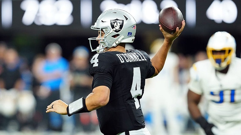 Dec 14, 2023; Paradise, Nevada, USA; Las Vegas Raiders quarterback Aidan O'Connell (4) throws a pass in the fourth quarter against the Los Angeles Chargers at Allegiant Stadium. Mandatory Credit: Stephen R. Sylvanie-USA TODAY Sports