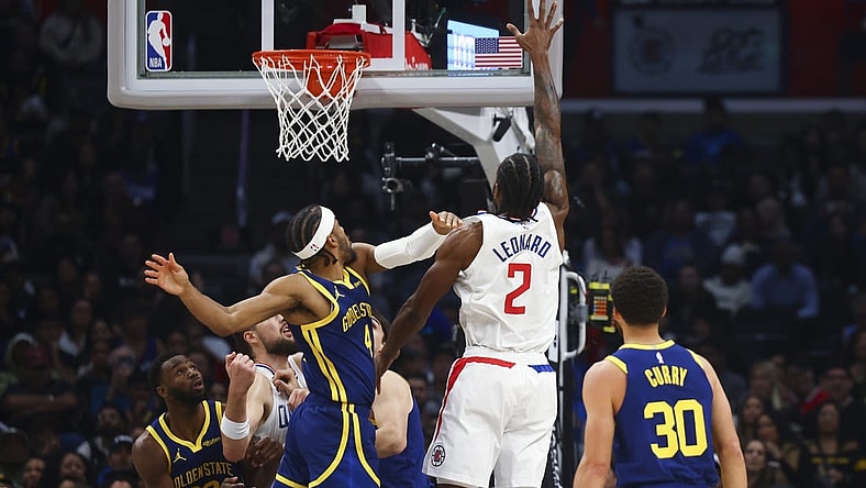 Dec 14, 2023; Los Angeles, California, USA; LA Clippers forward Kawhi Leonard (2) makes a layup during the first half of the game against the Golden State Warriors at Crypto.com Arena. Mandatory Credit: Jessica Alcheh-USA TODAY Sports