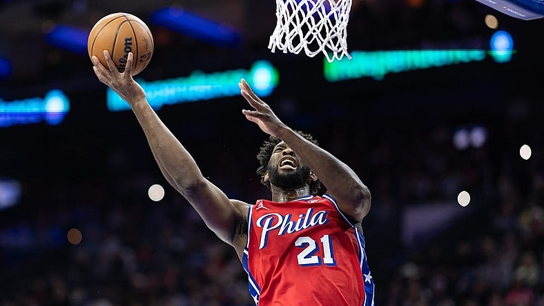 Dec 15, 2023; Philadelphia, Pennsylvania, USA; Philadelphia 76ers center Joel Embiid (21) drives for a shot against the Detroit Pistons during the first quarter at Wells Fargo Center. Mandatory Credit: Bill Streicher-USA TODAY Sports