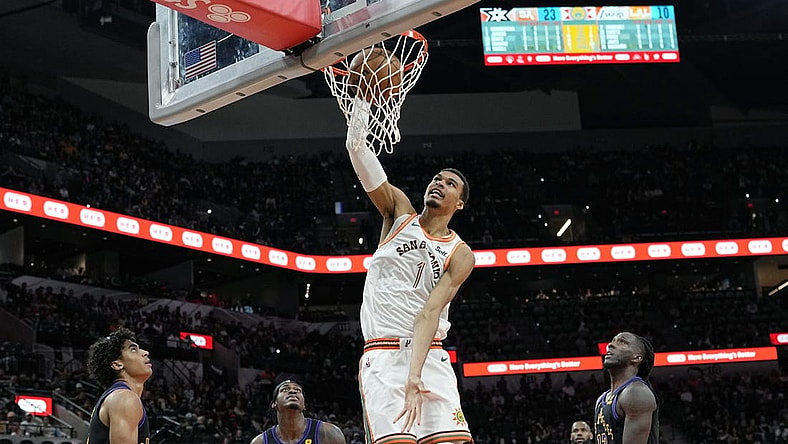 Dec 15, 2023; San Antonio, Texas, USA; San Antonio Spurs forward Victor Wembanyama (1) dunks during the first half against the Los Angeles Lakers at Frost Bank Center. Mandatory Credit: Scott Wachter-USA TODAY Sports