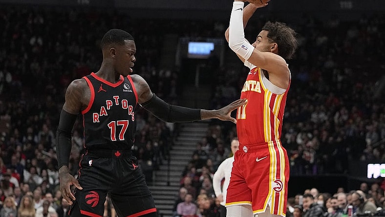Dec 15, 2023; Toronto, Ontario, CAN; Toronto Raptors guard Dennis Schroder (17) defends against Atlanta Hawks guard Trae Young (11) during the first half at Scotiabank Arena. Mandatory Credit: John E. Sokolowski-USA TODAY Sports