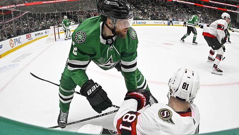 Dec 15, 2023; Dallas, Texas, USA; Dallas Stars defenseman Jani Hakanpaa (2) checks Ottawa Senators left wing Dominik Kubalik (81) during the second period at the American Airlines Center. Mandatory Credit: Jerome Miron-USA TODAY Sports