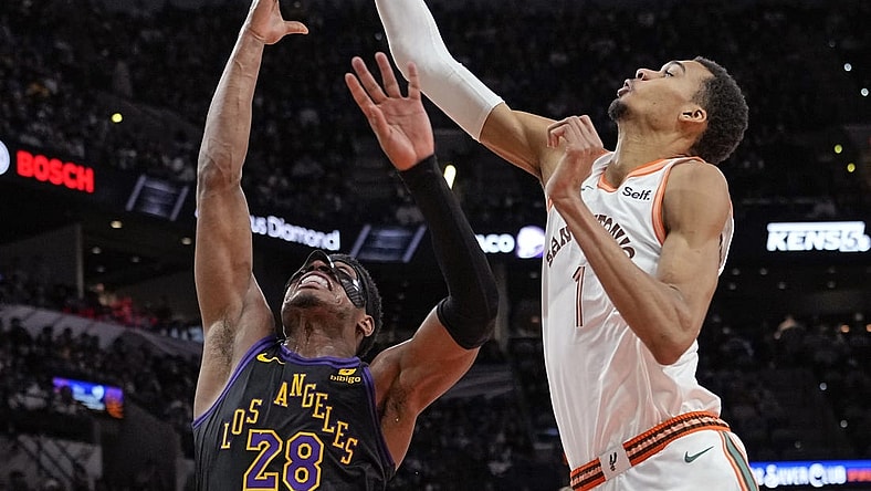Dec 15, 2023; San Antonio, Texas, USA; San Antonio Spurs forward Victor Wembanyama (1) blocks the shot attempt by Los Angeles Lakers forward Rui Hachimura (28) during the second half at Frost Bank Center. Mandatory Credit: Scott Wachter-USA TODAY Sports