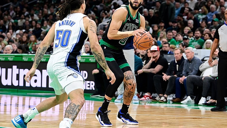 Dec 15, 2023; Boston, Massachusetts, USA; Boston Celtics forward Jayson Tatum (0) shoots the ball during the second half against the Orlando Magic at TD Garden. Mandatory Credit: Eric Canha-USA TODAY Sports