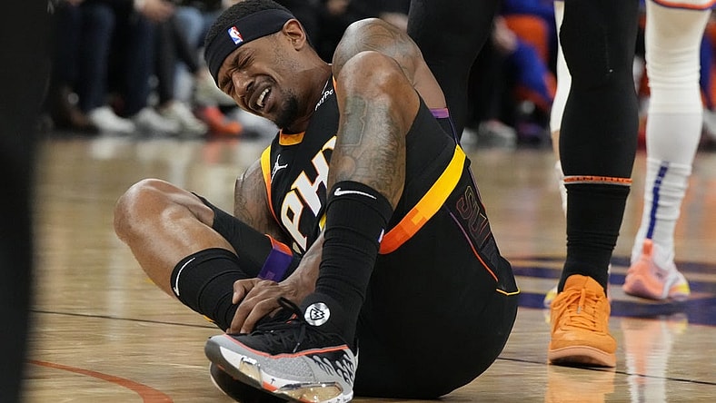 Dec 15, 2023; Phoenix, Arizona, USA; Phoenix Suns guard Bradley Beal (3) reacts after getting hurt against the New York Knicks in the first half at Footprint Center. Mandatory Credit: Rick Scuteri-USA TODAY Sports