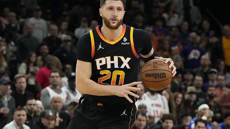 Dec 15, 2023; Phoenix, Arizona, USA; Phoenix Suns center Jusuf Nurkic (20) drives on the New York Knicks in the second half at Footprint Center. Mandatory Credit: Rick Scuteri-USA TODAY Sports