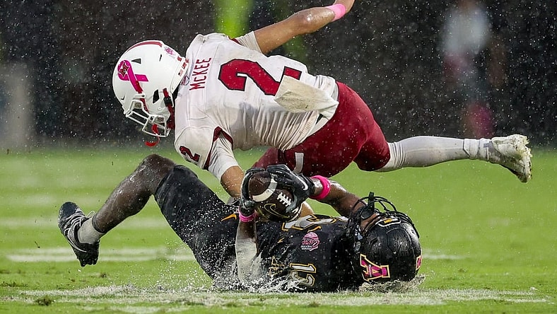 Dec 16, 2023; Orlando, FL, USA;  Appalachian State Mountaineers wide receiver Christan Horn (13) receives a pass guarded byAppalachian State Mountaineers cornerback Tyrek Funderburk (2) in the second quarter during the Avocados from Mexico Cure Bowl at FBC Mortgage Stadium. Mandatory Credit: Nathan Ray Seebeck-USA TODAY Sports