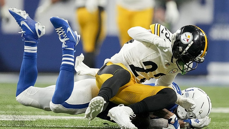 Dec 16, 2023; Indianapolis, Indiana, USA; Indianapolis Colts wide receiver Michael Pittman Jr. (11) collides with Pittsburgh Steelers safety Damontae Kazee (23) during a game against the Pittsburgh Steelers at Lucas Oil Stadium. Mandatory Credit: Robert Scheer-USA TODAY Sports