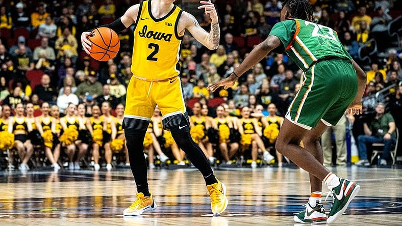 Iowa's Brock Harding directs the offense during the Hawkeye Showcase at Wells Fargo Arena on Saturday, Dec. 16, 2023, in Des Moines.