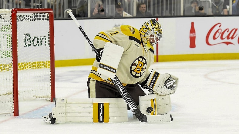 Dec 16, 2023; Boston, Massachusetts, USA;  Boston Bruins goaltender Jeremy Swayman (1) makes a save during the second period against the New York Rangers at TD Garden. Mandatory Credit: Bob DeChiara-USA TODAY Sports