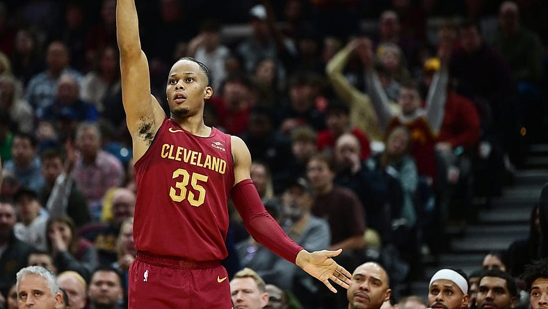 Dec 16, 2023; Cleveland, Ohio, USA; Cleveland Cavaliers forward Isaac Okoro (35) hits a three point basket during the second half against the Atlanta Hawks at Rocket Mortgage FieldHouse. Mandatory Credit: Ken Blaze-USA TODAY Sports