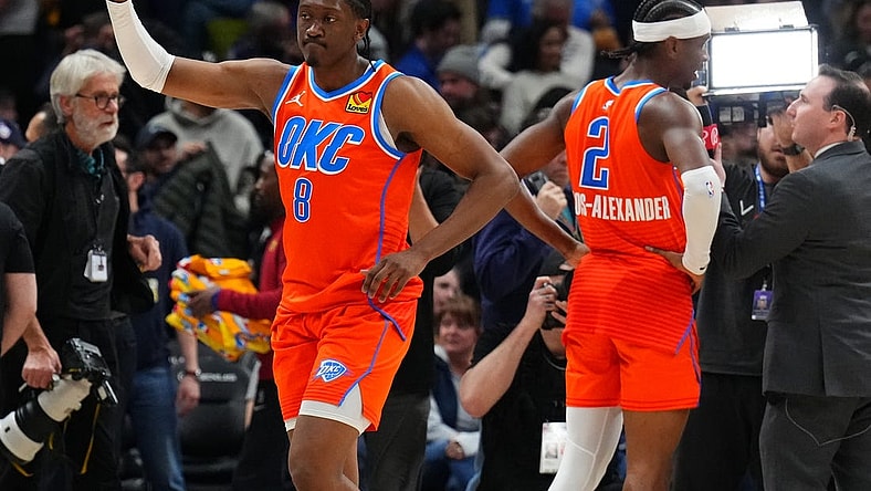 Dec 16, 2023; Denver, Colorado, USA; Oklahoma City Thunder forward Jalen Williams (8) and guard Shai Gilgeous-Alexander (2) celebrate after defeating the Denver Nuggets at Ball Arena. Mandatory Credit: Ron Chenoy-USA TODAY Sports
