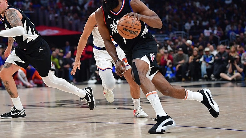 Dec 16, 2023; Los Angeles, California, USA; Los Angeles Clippers guard James Harden (1) moves to the basket against the New York Knicks during the first half at Crypto.com Arena. Mandatory Credit: Gary A. Vasquez-USA TODAY Sports