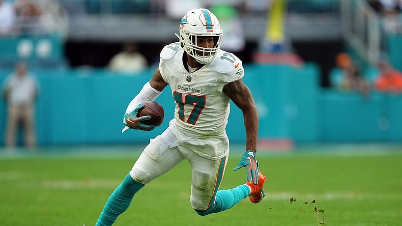 Dec 17, 2023; Miami Gardens, Florida, USA; Miami Dolphins wide receiver Jaylen Waddle (17) runs with the ball against the New York Jets during the second half at Hard Rock Stadium. Mandatory Credit: Jasen Vinlove-USA TODAY Sports