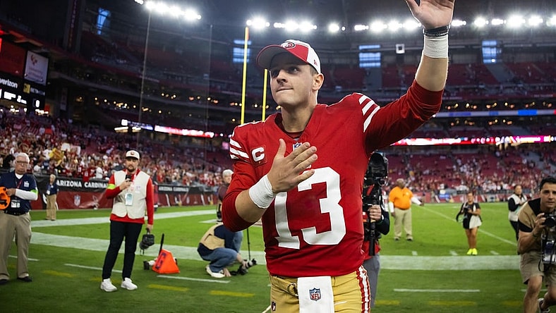 Dec 17, 2023; Glendale, Arizona, USA; San Francisco 49ers quarterback Brock Purdy (13) celebrates following the game against the Arizona Cardinals at State Farm Stadium. Mandatory Credit: Mark J. Rebilas-USA TODAY Sports