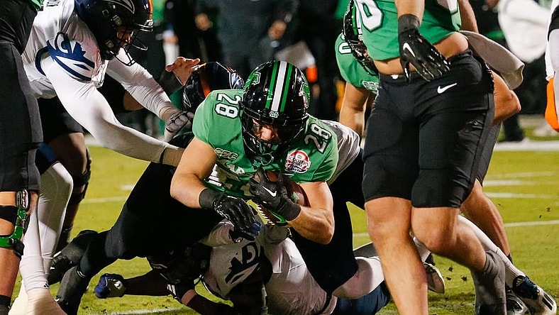 Dec 19, 2023; Frisco, TX, USA; Marshall Thundering Herd running back Ethan Payne (28) scores a touchdown during the first quarter against the UTSA Roadrunners at Toyota Stadium. Mandatory Credit: Andrew Dieb-USA TODAY Sports