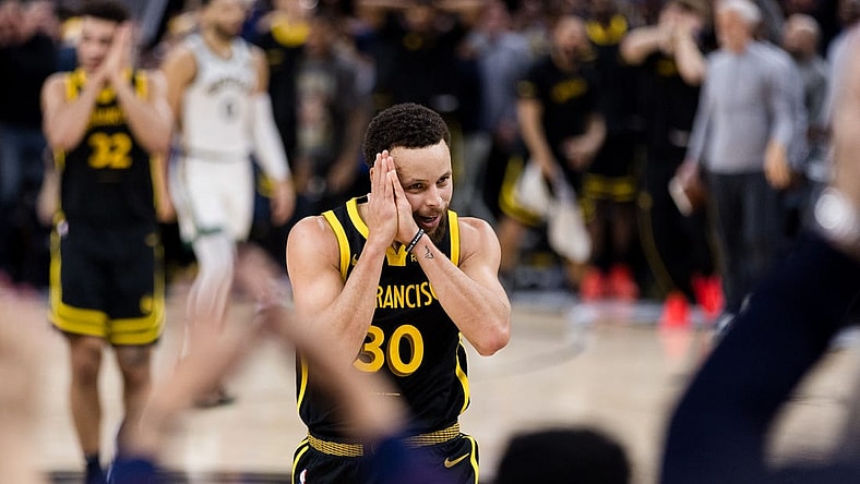 Dec 19, 2023; San Francisco, California, USA; Golden State Warriors guard Stephen Curry (30) reacts after scoring against the Boston Celtics during the overtime period at Chase Center. Mandatory Credit: John Hefti-USA TODAY Sports