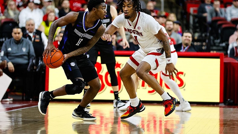 Dec 20, 2023; Raleigh, North Carolina, USA; Saint Louis Billikens guard Cian Medley (1) dribbles with the ball during the first half against North Carolina State Wolfpack at PNC Arena. Mandatory Credit: Jaylynn Nash-USA TODAY Sports