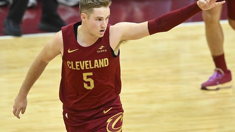 Dec 20, 2023; Cleveland, Ohio, USA; Cleveland Cavaliers guard Sam Merrill (5) celebrates his three-point basket in the fourth quarter against the Utah Jazz at Rocket Mortgage FieldHouse. Mandatory Credit: David Richard-USA TODAY Sports