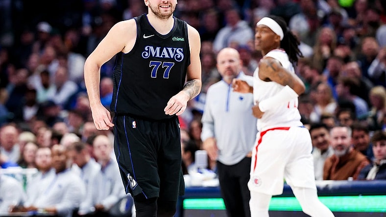 Dec 20, 2023; Dallas, Texas, USA;  Dallas Mavericks guard Luka Doncic (77) reacts after scoring during the second quarter against the LA Clippers at American Airlines Center. Mandatory Credit: Kevin Jairaj-USA TODAY Sports