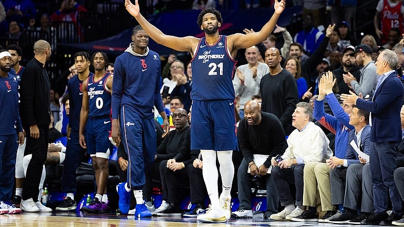 Dec 20, 2023; Philadelphia, Pennsylvania, USA; Philadelphia 76ers center Joel Embiid (21) reacts with fans after leaving the game in the closing seconds of a victory against the Minnesota Timberwolves at Wells Fargo Center. Mandatory Credit: Bill Streicher-USA TODAY Sports