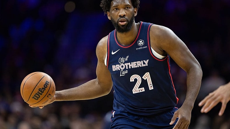 Dec 20, 2023; Philadelphia, Pennsylvania, USA; Philadelphia 76ers center Joel Embiid (21) dribbles up court against the Minnesota Timberwolves during the third quarter at Wells Fargo Center. Mandatory Credit: Bill Streicher-USA TODAY Sports