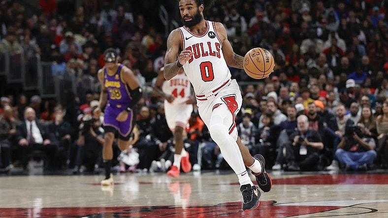 Dec 20, 2023; Chicago, Illinois, USA; Chicago Bulls guard Coby White (0) brings the ball up court against the Los Angeles Lakers during the first half at United Center. Mandatory Credit: Kamil Krzaczynski-USA TODAY Sports