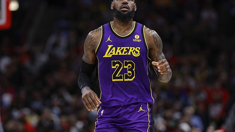Dec 20, 2023; Chicago, Illinois, USA; Los Angeles Lakers forward LeBron James (23) looks on during the first half at United Center. Mandatory Credit: Kamil Krzaczynski-USA TODAY Sports