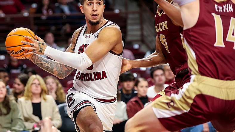 Dec 22, 2023; Columbia, South Carolina, USA; South Carolina Gamecocks guard Myles Stute (10) looks to pass against the Elon Phoenix in the first half at Colonial Life Arena. Mandatory Credit: Jeff Blake-USA TODAY Sports