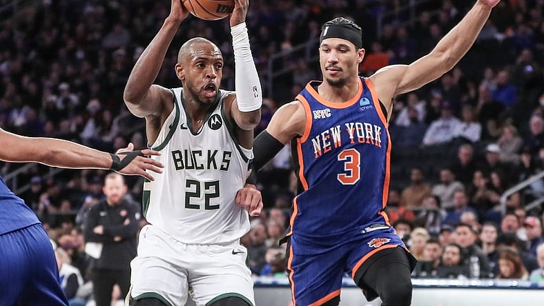 Dec 23, 2023; New York, New York, USA;  Milwaukee Bucks forward Khris Middleton (22) looks to drive past New York Knicks guard Josh Hart (3) in the fourth quarter at Madison Square Garden. Mandatory Credit: Wendell Cruz-USA TODAY Sports