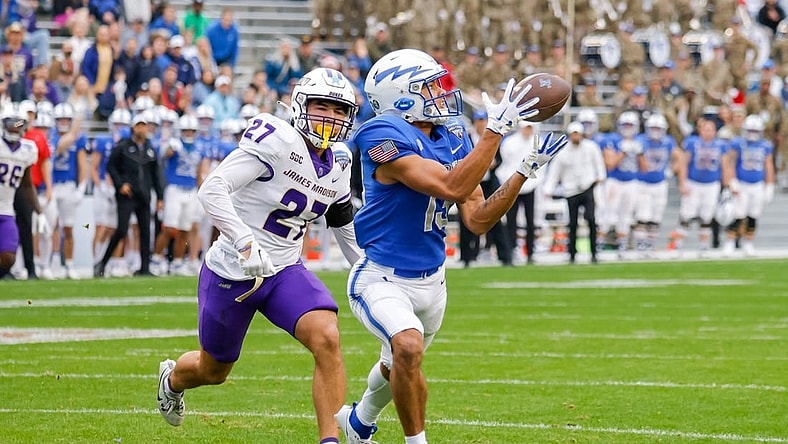 Dec 23, 2023; Fort Worth, TX, USA;  Air Force Falcons wide receiver Jared Roznos (13) catches a touchdown reception late in the second quarter with James Madison Dukes safety Jacob Thomas (27) defending at Amon G. Carter Stadium. Mandatory Credit: Andrew Dieb-USA TODAY Sports
