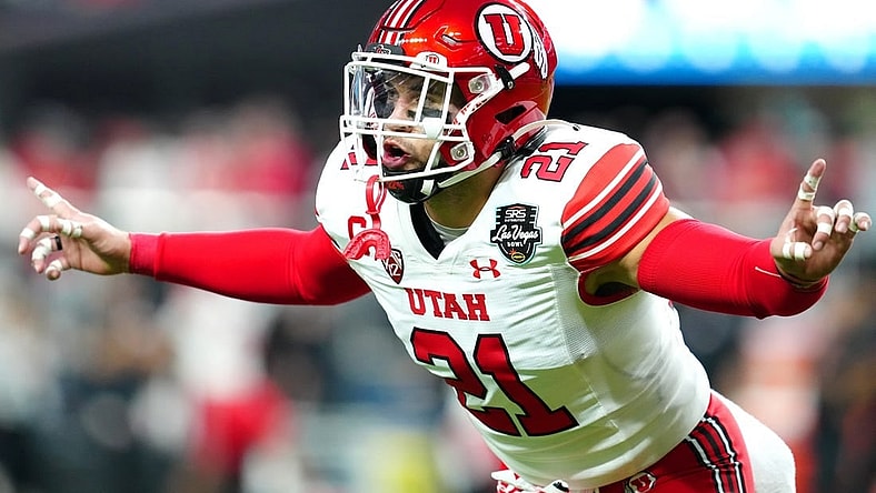 Dec 23, 2023; Las Vagas, NV, USA; Utah Utes linebacker Karene Reid (21) warms up before a game against the Northwestern Wildcats at Allegiant Stadium. Mandatory Credit: Stephen R. Sylvanie-USA TODAY Sports