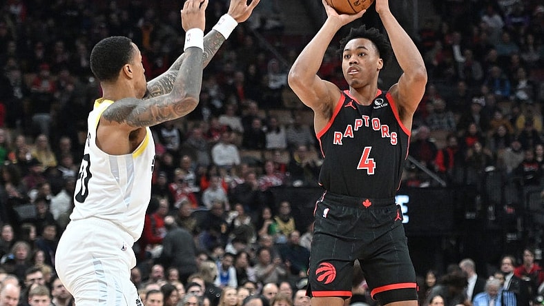 Dec 23, 2023; Toronto, Ontario, CAN;  Toronto Raptors forward Scottie Barnes (4) shoots the ball over Utah Jazz forward John Collins (20) in the first half at Scotiabank Arena. Mandatory Credit: Dan Hamilton-USA TODAY Sports