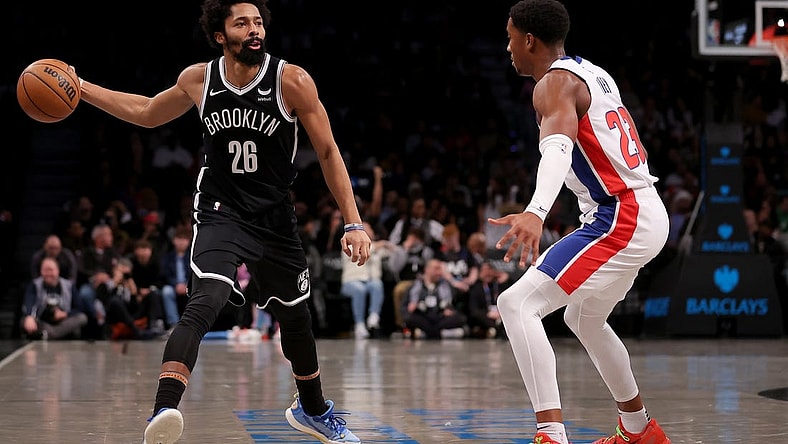 Dec 23, 2023; Brooklyn, New York, USA; Brooklyn Nets guard Spencer Dinwiddie (26) looks to pass the ball against Detroit Pistons guard Jaden Ivey (23) during the second quarter at Barclays Center. Mandatory Credit: Brad Penner-USA TODAY Sports