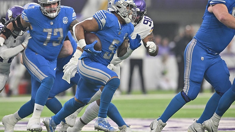 Dec 24, 2023; Minneapolis, Minnesota, USA; Detroit Lions running back David Montgomery (5) runs the ball as Minnesota Vikings defensive end Jonathan Bullard (90) chases during the first quarter at U.S. Bank Stadium. Mandatory Credit: Jeffrey Becker-USA TODAY Sports
