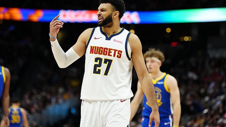 Dec 25, 2023; Denver, Colorado, USA; Denver Nuggets guard Jamal Murray (27) reacts in the first quarter against the Golden State Warriors at Ball Arena. Mandatory Credit: Ron Chenoy-USA TODAY Sports