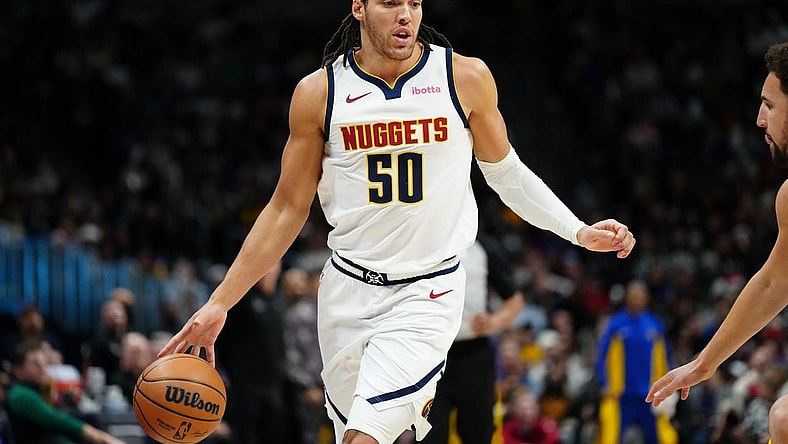 Dec 25, 2023; Denver, Colorado, USA; Denver Nuggets forward Aaron Gordon (50) during  the third quarter against the Golden State Warriors at Ball Arena. Mandatory Credit: Ron Chenoy-USA TODAY Sports