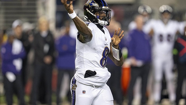Dec 25, 2023; Santa Clara, California, USA; Baltimore Ravens quarterback Lamar Jackson (8) passes the football against the San Francisco 49ers during the first quarter at Levi's Stadium. Mandatory Credit: Neville E. Guard-USA TODAY Sports